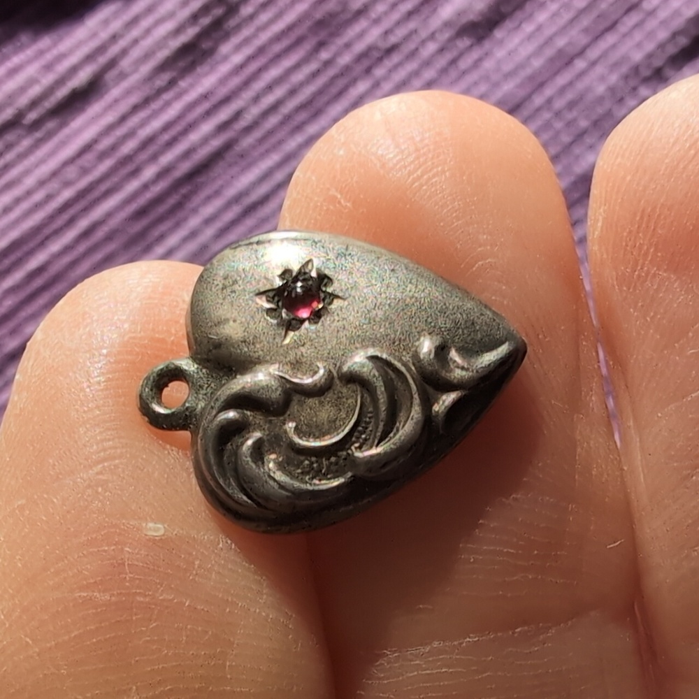 Antique sterling silver puffed heart charm